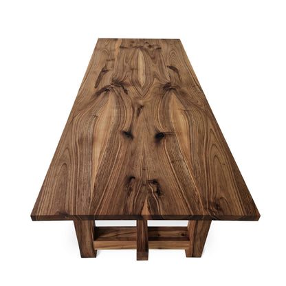 ELSA rustic farmer-style dining table made of solid walnut wood, rectangular and extendable, with open leg design, shown from a long side view.
