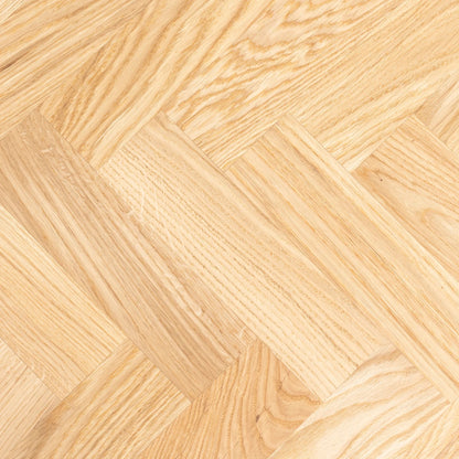 Gaia herringbone solid wood extendable dining table in clear oak with square metal legs – luxury solid wood furniture piece.
