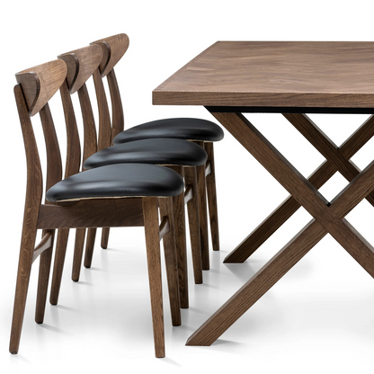 Gaia herringbone solid wood extendable dining table in chocolate oak with cross wood legs – luxury solid wood furniture piece.