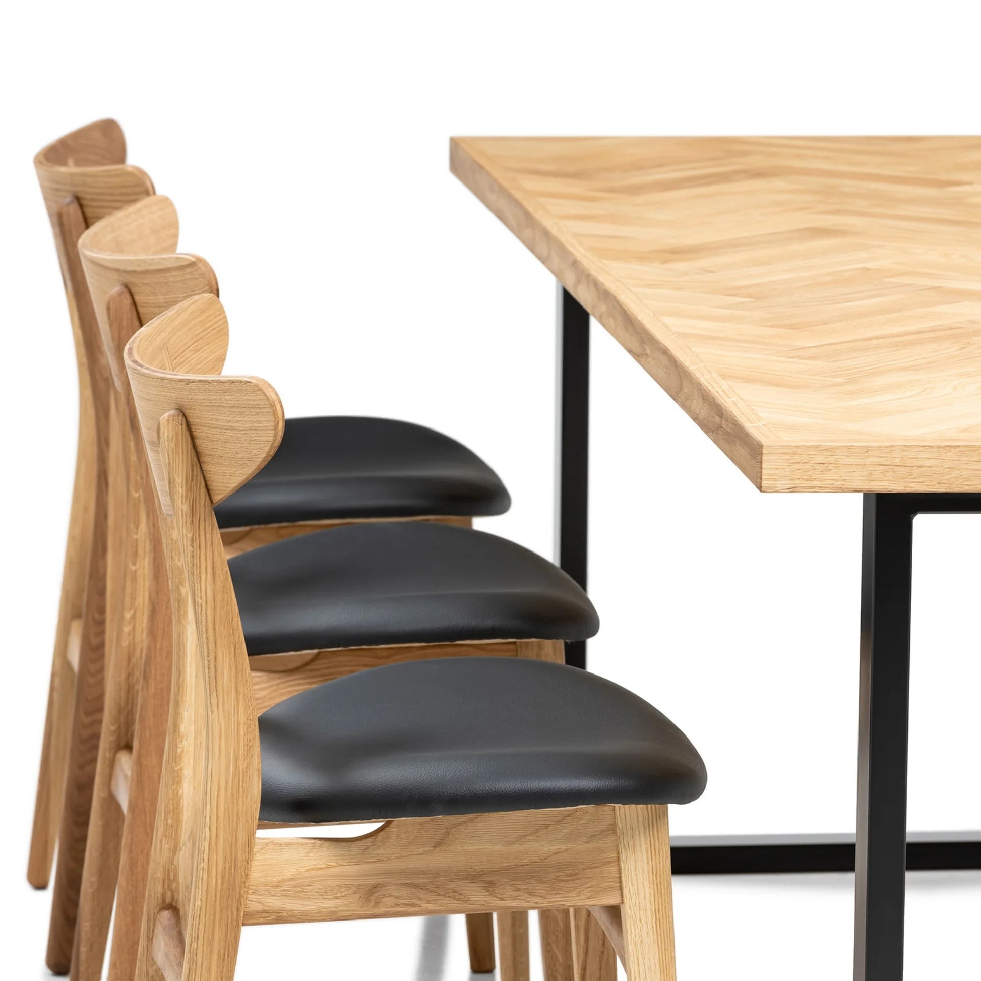 Gaia herringbone solid wood extendable dining table in clear oak with square metal legs – luxury solid wood furniture, custom made.
