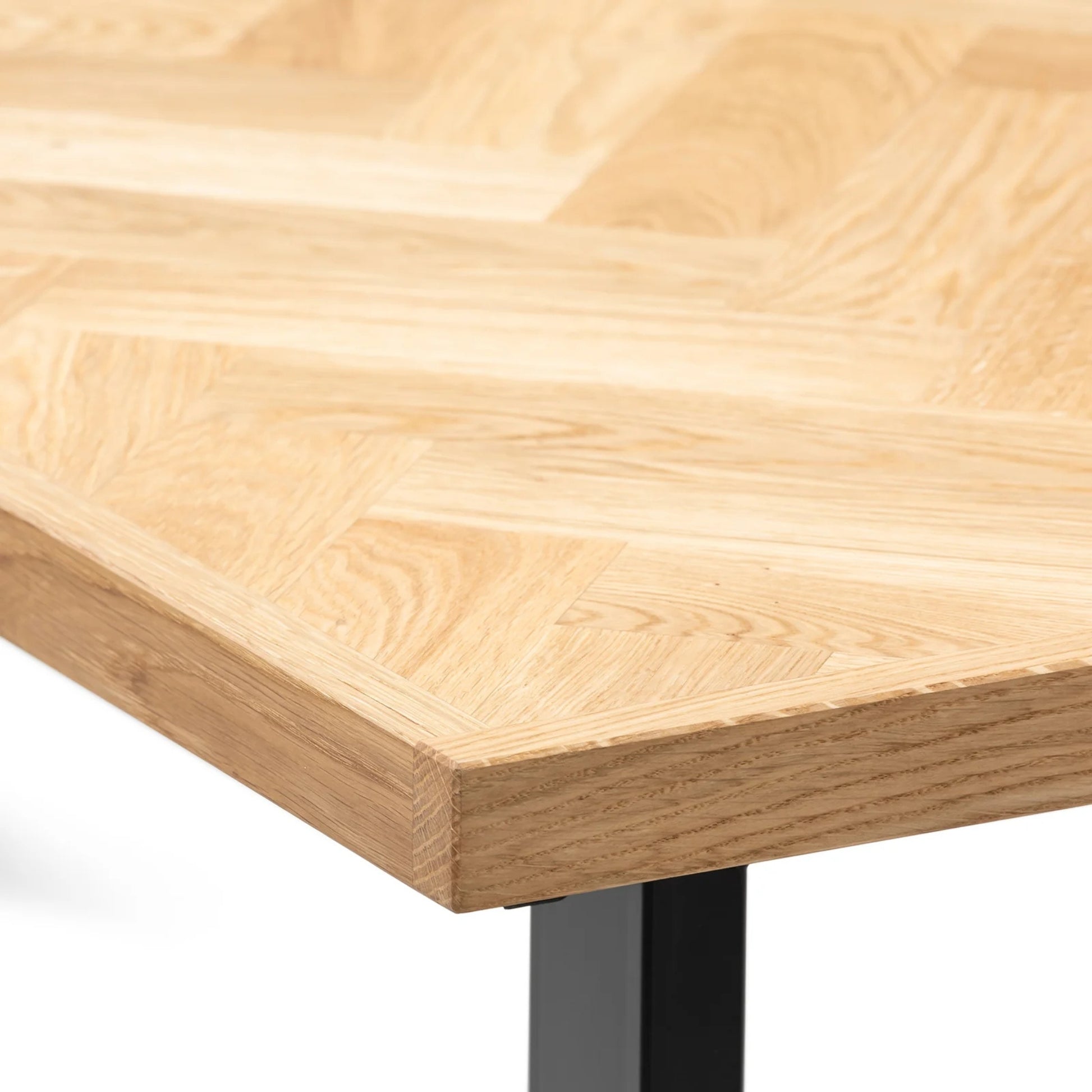 Gaia herringbone solid wood extendable dining table in clear oak with square metal legs – luxury solid wood furniture, custom made.