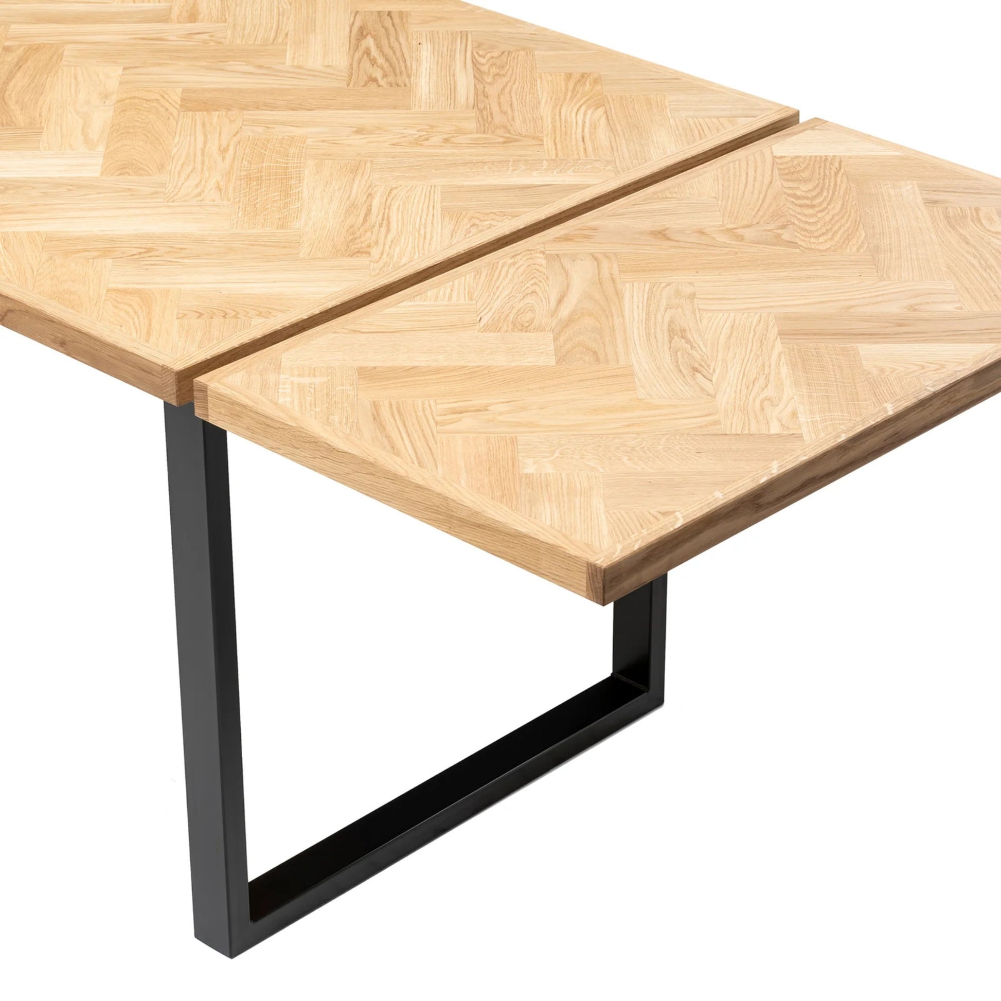 Gaia herringbone solid wood extendable dining table in clear oak with square metal legs – luxury solid wood furniture, custom made.