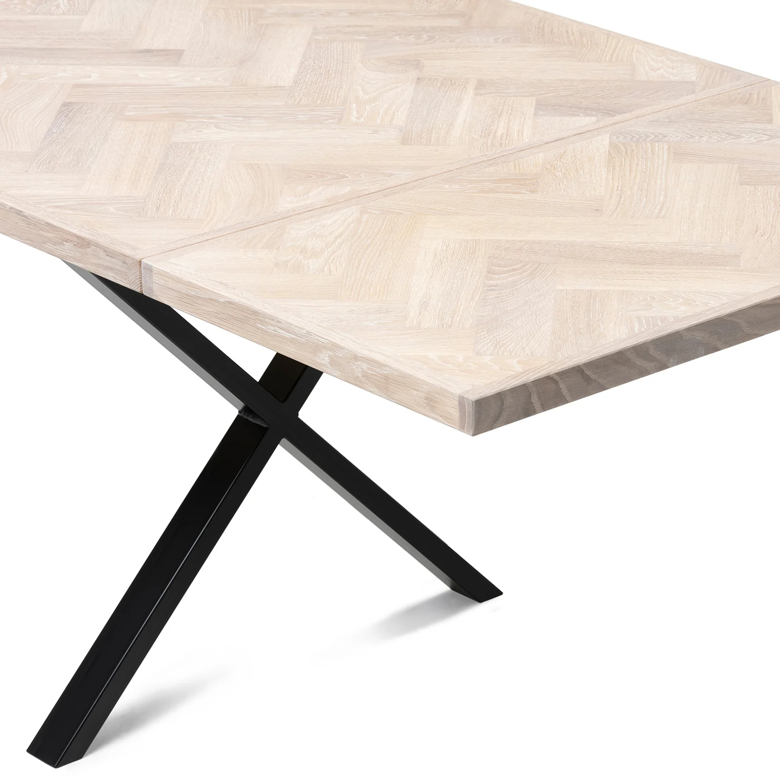 Gaia herringbone solid wood extendable dining table in white oak with cross metal legs – luxury solid wood furniture piece.