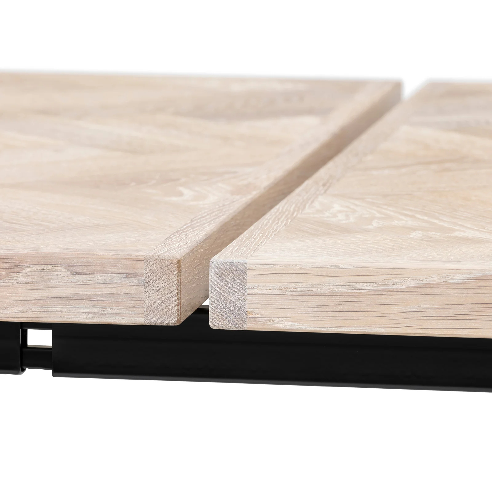 Gaia herringbone solid wood extendable dining table in white oak with cross metal legs – luxury solid wood furniture piece.