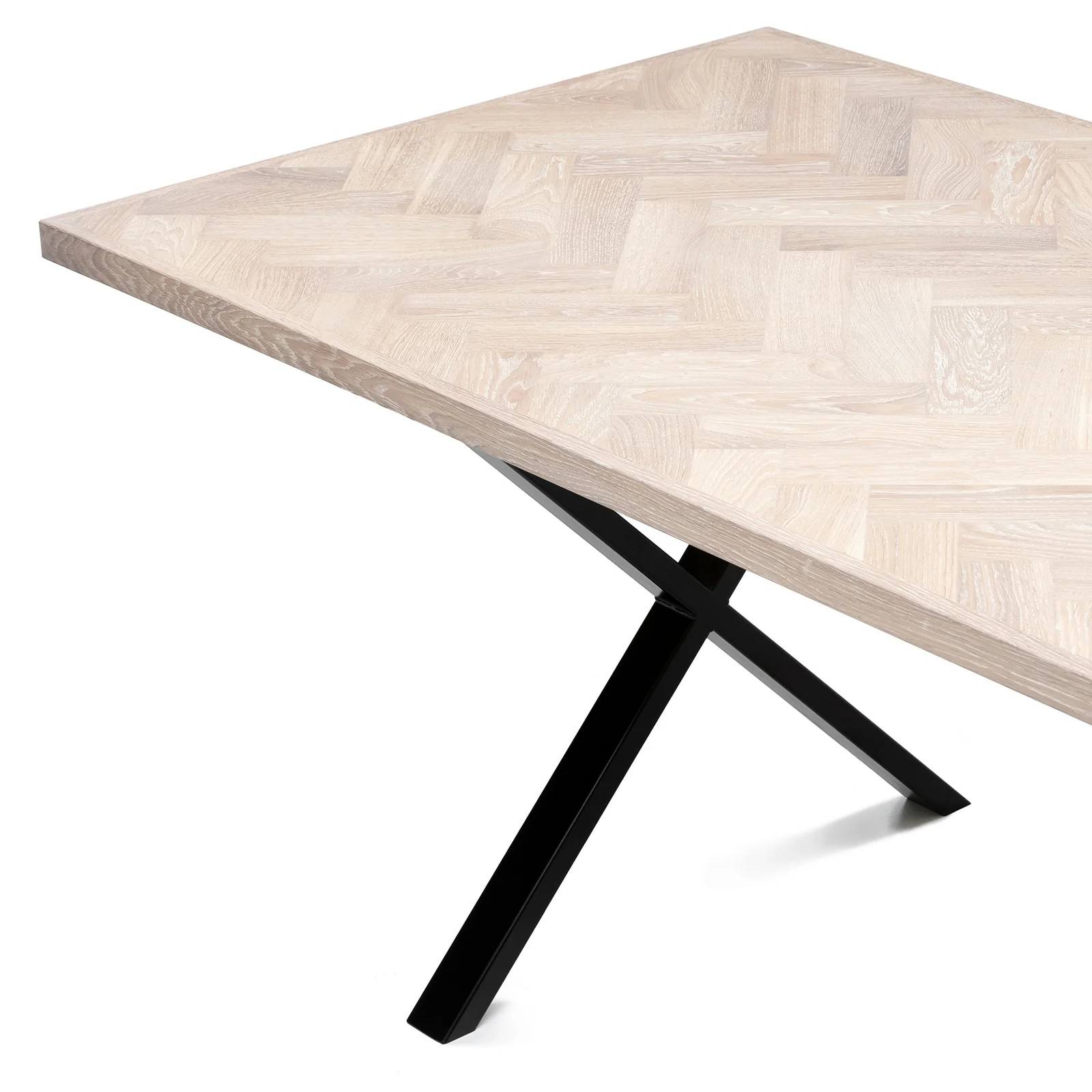 Gaia herringbone solid wood extendable dining table in white oak with cross metal legs – luxury solid wood furniture piece.