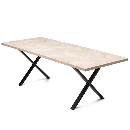 Gaia herringbone solid wood extendable dining table in white oak with cross metal legs – luxury solid wood furniture piece.