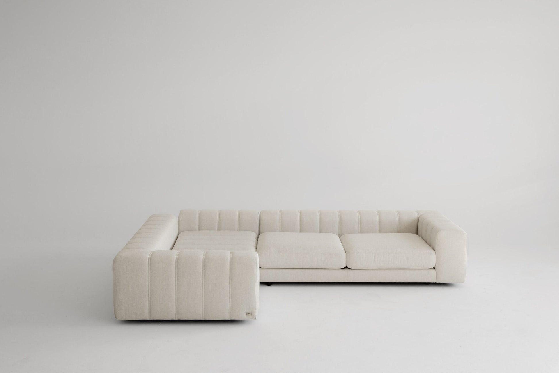 Beige memory foam sofa on a white background