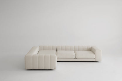 Beige memory foam sofa on a white background