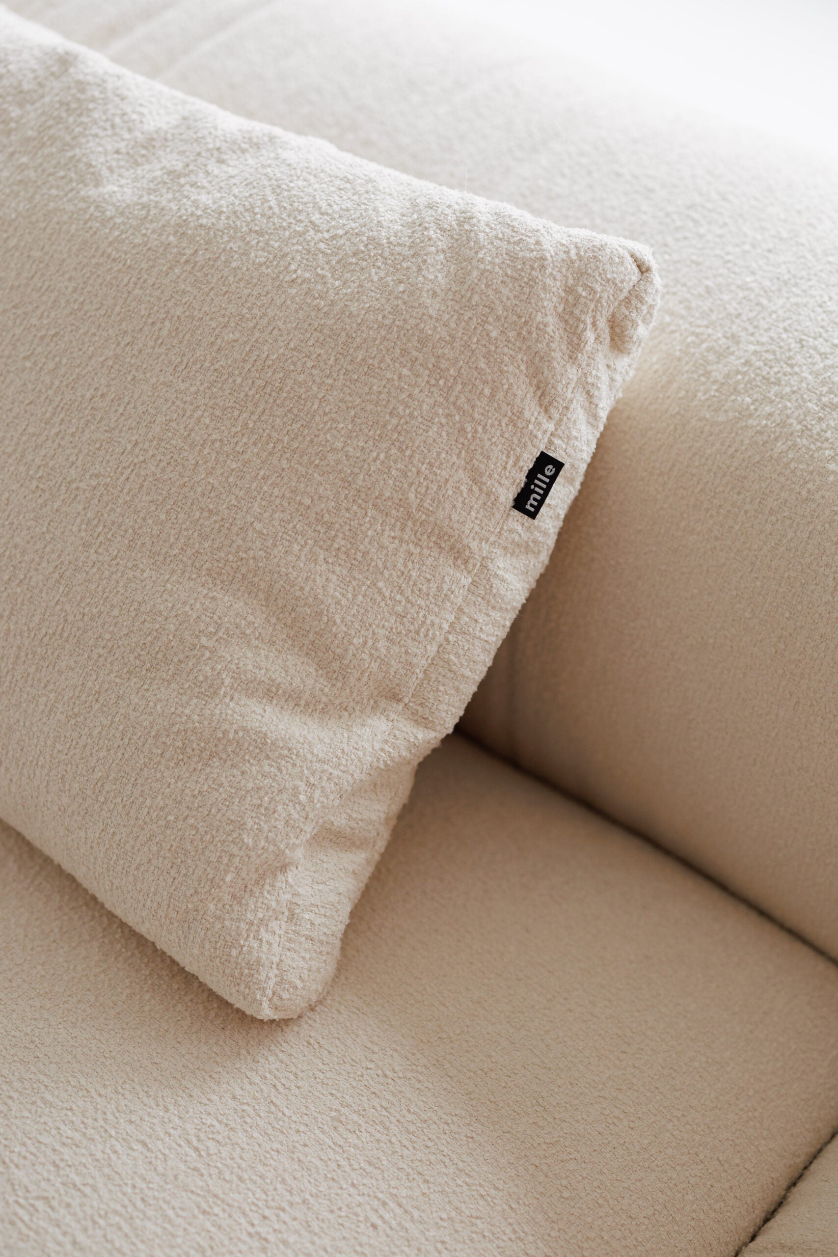 Deep-seated sectional sofa with oversized cushions – perfect for lounging.