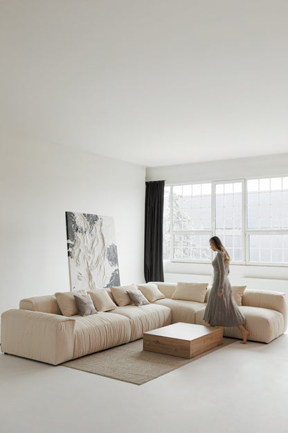 Deep-seated sectional sofa with oversized cushions – perfect for lounging.