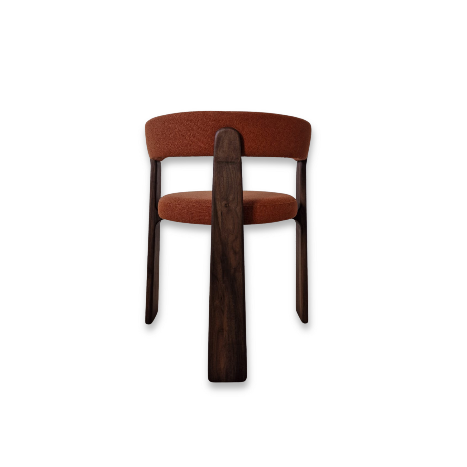 Luna solid wood dining chair in rich Chocolate Walnut finish, featuring a sculptural round silhouette and handcrafted from FSC certified walnut or oak planks. This bespoke, premium dining chair offers a choice of natural leather or luxury upholstery, blending sustainable craftsmanship with modern elegance for timeless interiors.
