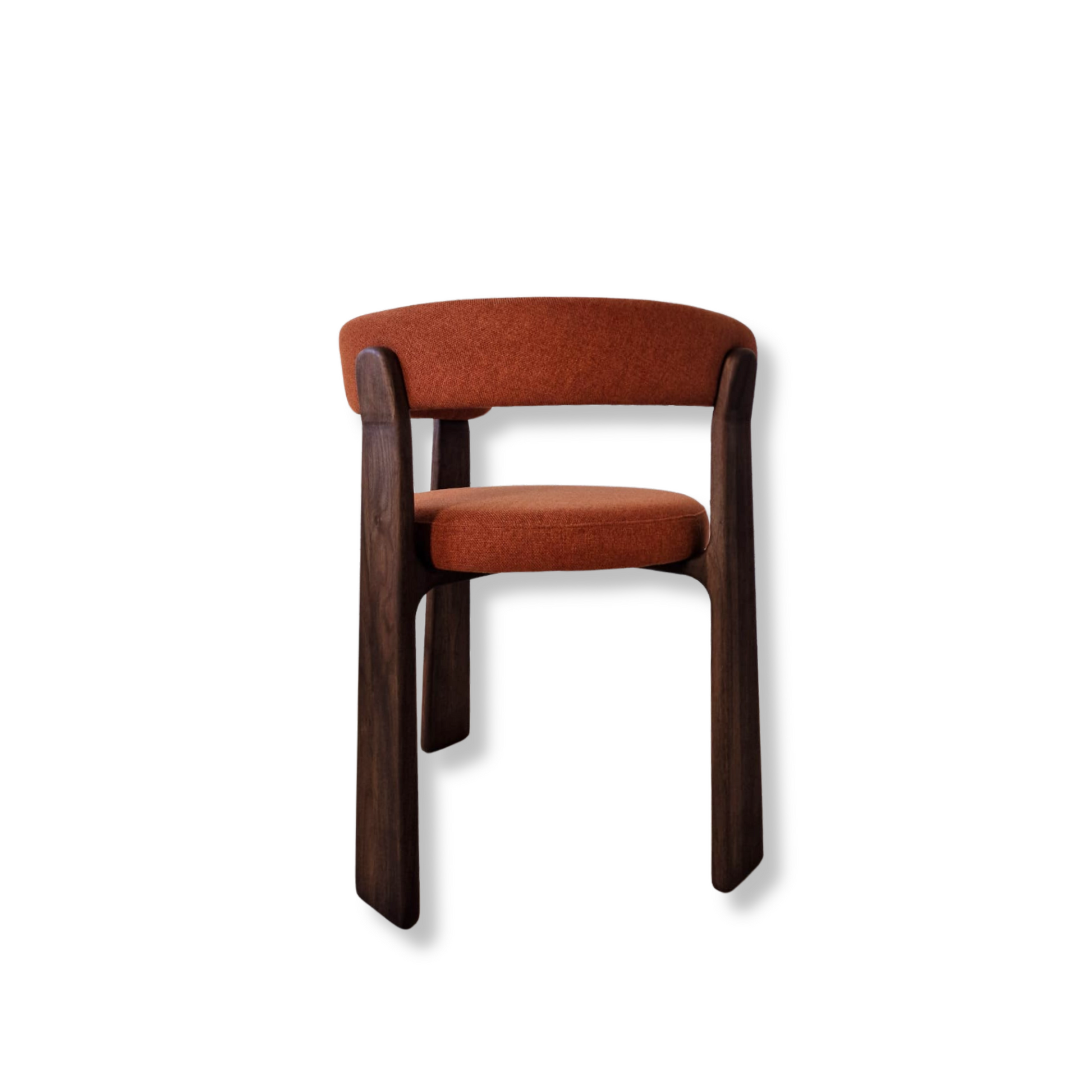 Luna solid wood dining chair in rich Chocolate Walnut finish, featuring a sculptural round silhouette and handcrafted from FSC certified walnut or oak planks. This bespoke, premium dining chair offers a choice of natural leather or luxury upholstery, blending sustainable craftsmanship with modern elegance for timeless interiors.