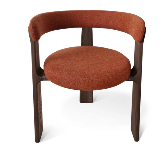 Luna solid wood dining chair in rich Chocolate Walnut finish, featuring a sculptural round silhouette and handcrafted from FSC certified walnut or oak planks. This bespoke, premium dining chair offers a choice of natural leather or luxury upholstery, blending sustainable craftsmanship with modern elegance for timeless interiors.