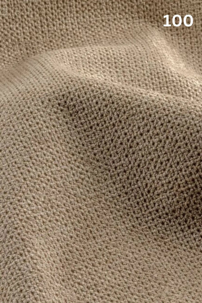 Close-up of beige fabric texture with a slight wave pattern and number '100' in the corner. 