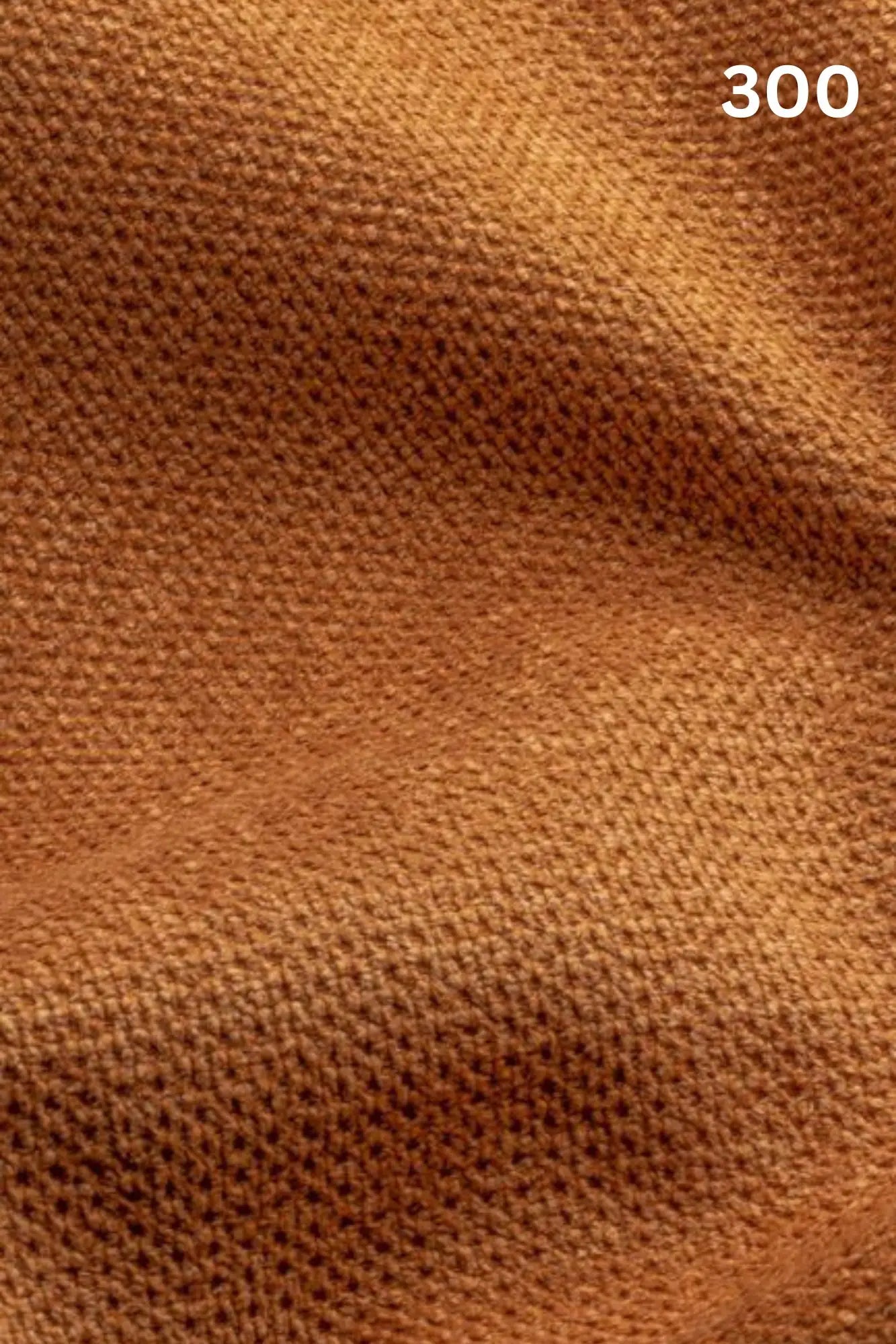 Close-up of yellow fabric texture with a slight wave pattern and number '300' in the corner. 