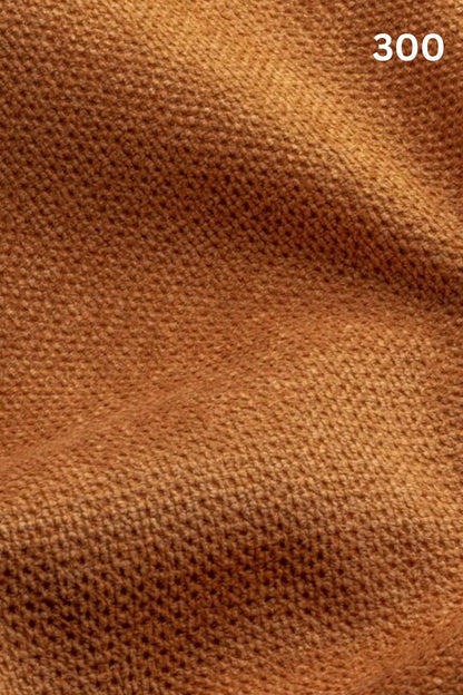Close-up of yellow fabric texture with a slight wave pattern and number '300' in the corner. 