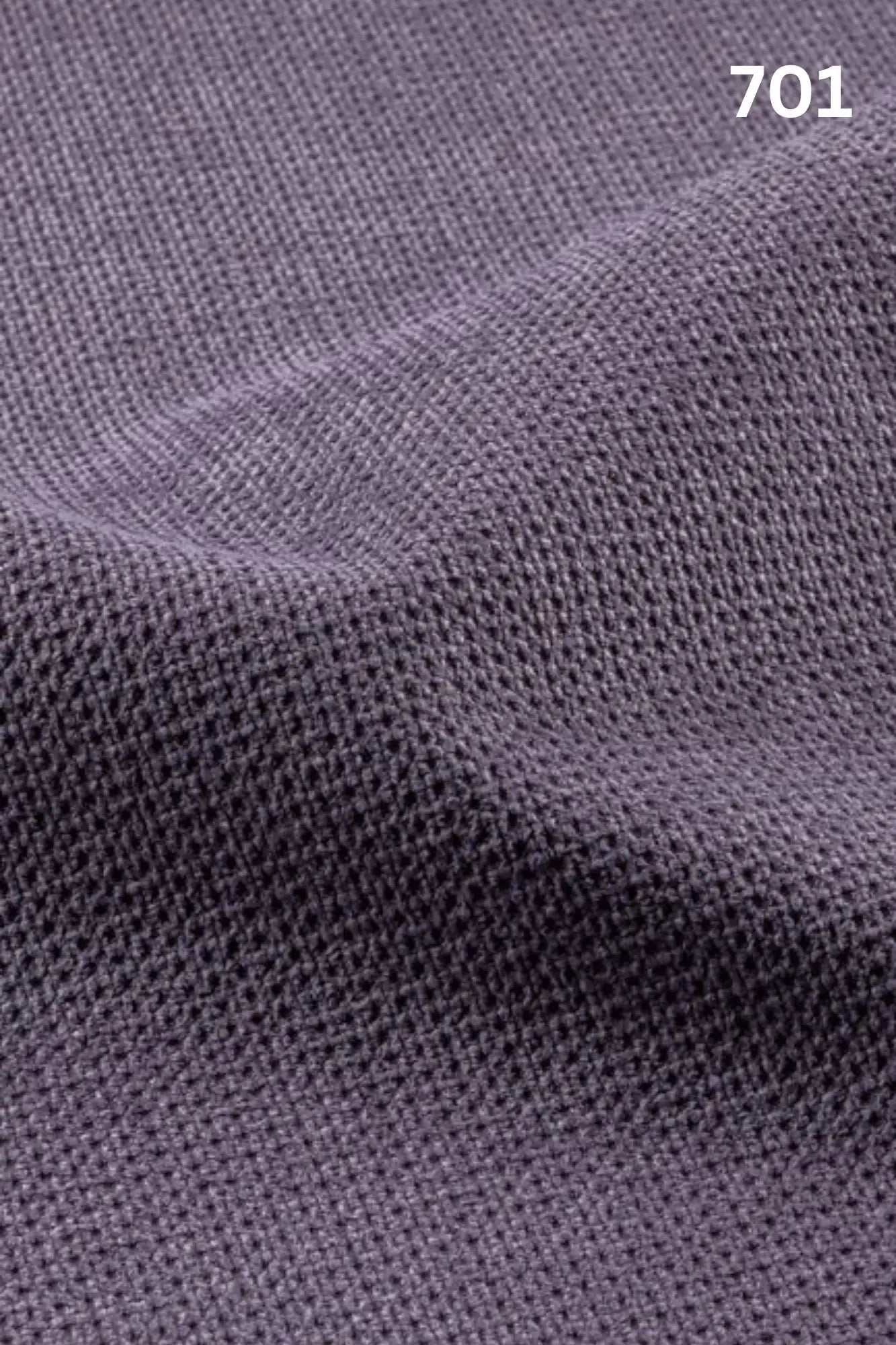 Close-up of velvet fabric texture with a slight wave pattern and number '701' in the corner. 