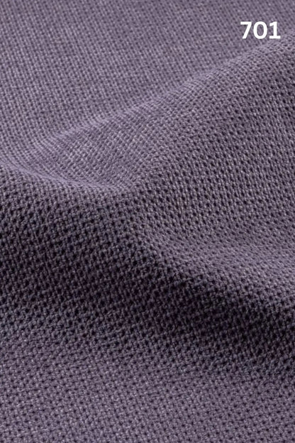 Close-up of velvet fabric texture with a slight wave pattern and number '701' in the corner. 