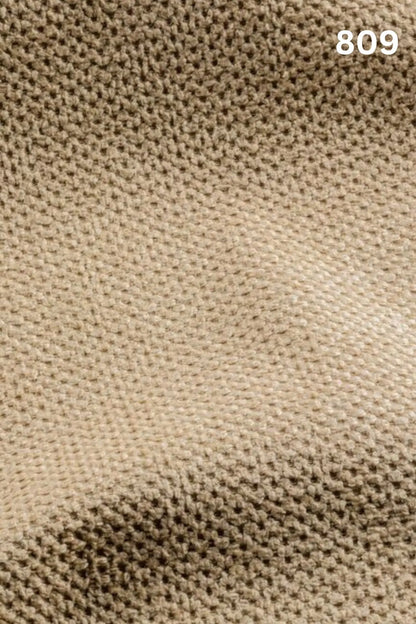 Close-up of yellow fabric texture with a slight wave pattern and number '809' in the corner. 