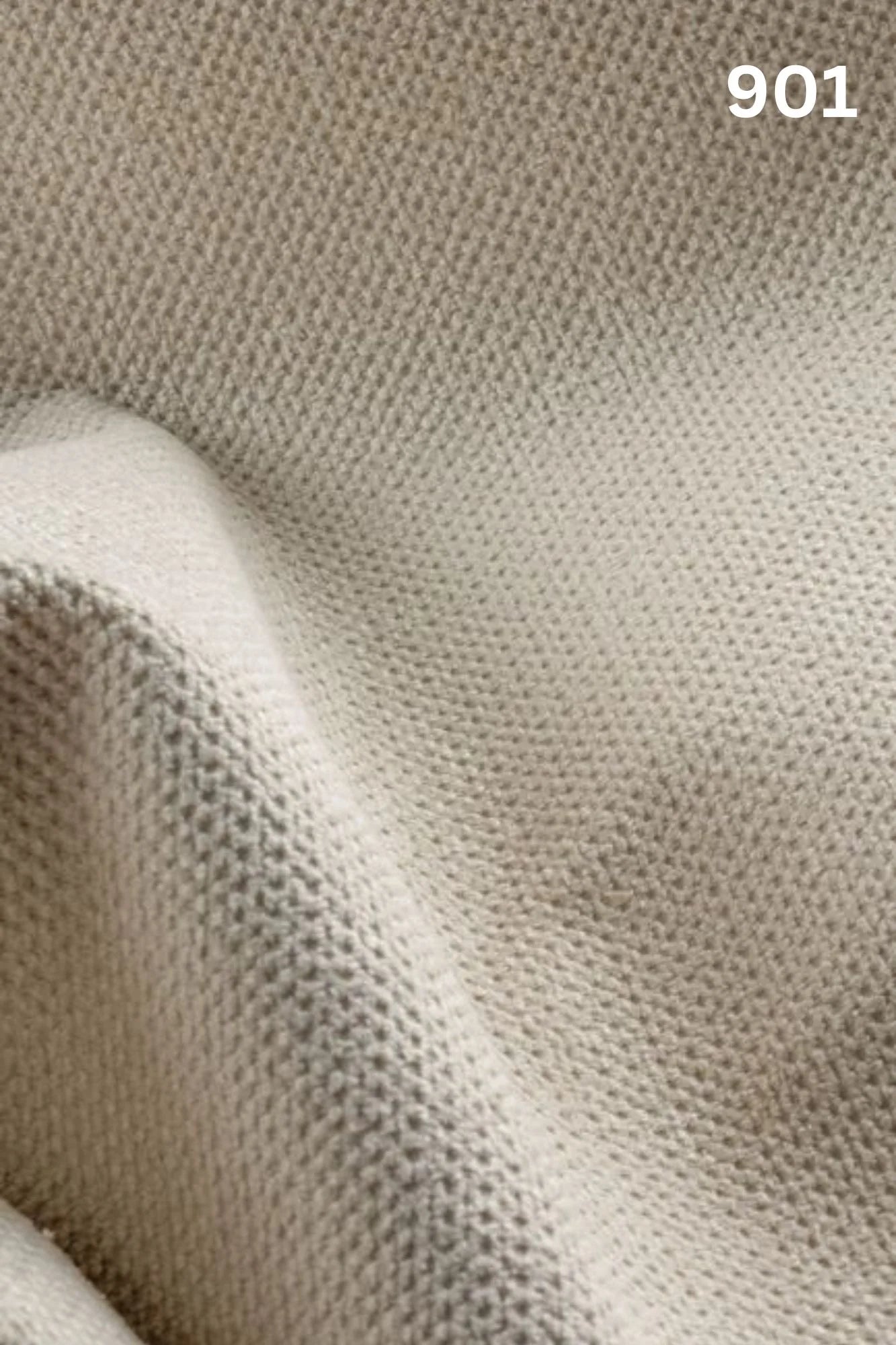 Close-up of white fabric texture with a slight wave pattern and number '901' in the corner. 
