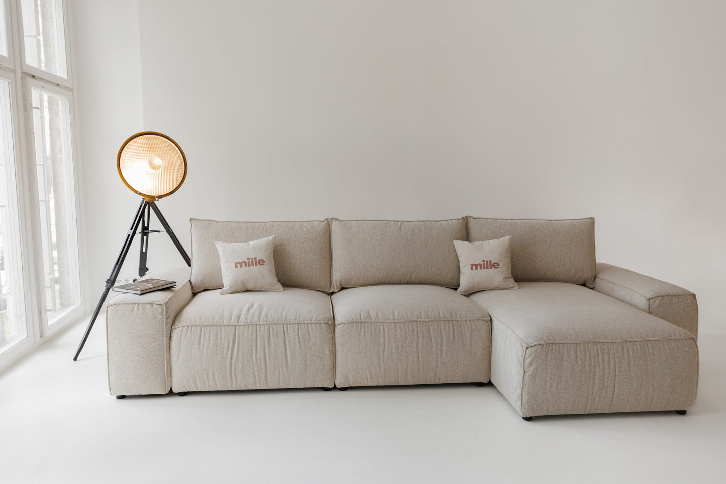 Milano modular sofa in premium Belgian fabric, corner view – extendable bespoke sofa with built-in storage, low-profile modern design, upholstered in premium durable fabric, featuring polyurethane and memory foam seat cushions with plywood frame. Stylish and functional seating and sleeping solution for contemporary interiors.