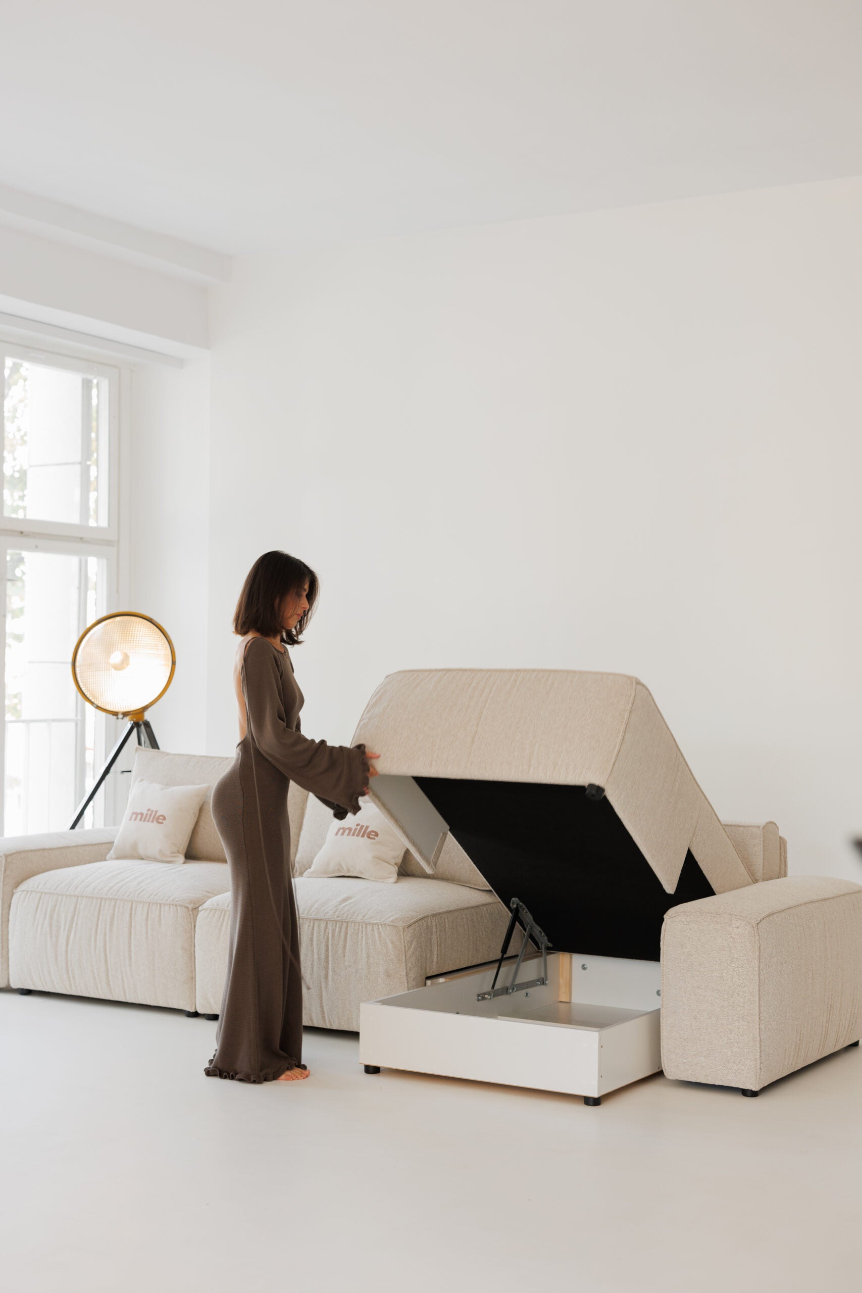 Milano modular sofa in premium Belgian fabric, corner view – extendable bespoke sofa with built-in storage, low-profile modern design, upholstered in premium durable fabric, featuring polyurethane and memory foam seat cushions with plywood frame. Stylish and functional seating and sleeping solution for contemporary interiors.