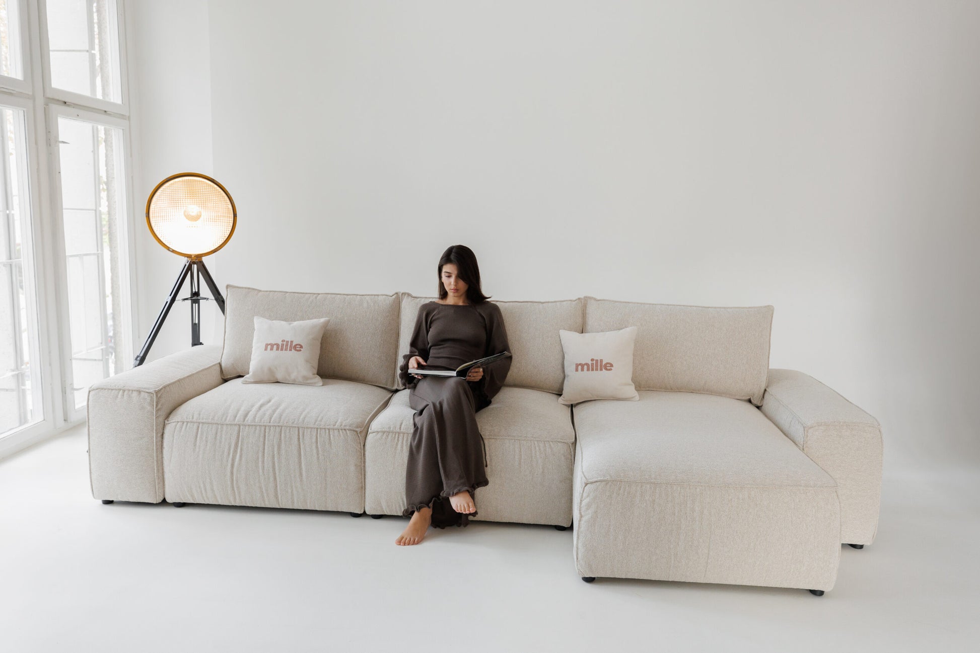 Milano modular sofa in premium Belgian fabric, corner view – extendable bespoke sofa with built-in storage, low-profile modern design, upholstered in premium durable fabric, featuring polyurethane and memory foam seat cushions with plywood frame. Stylish and functional seating and sleeping solution for contemporary interiors.