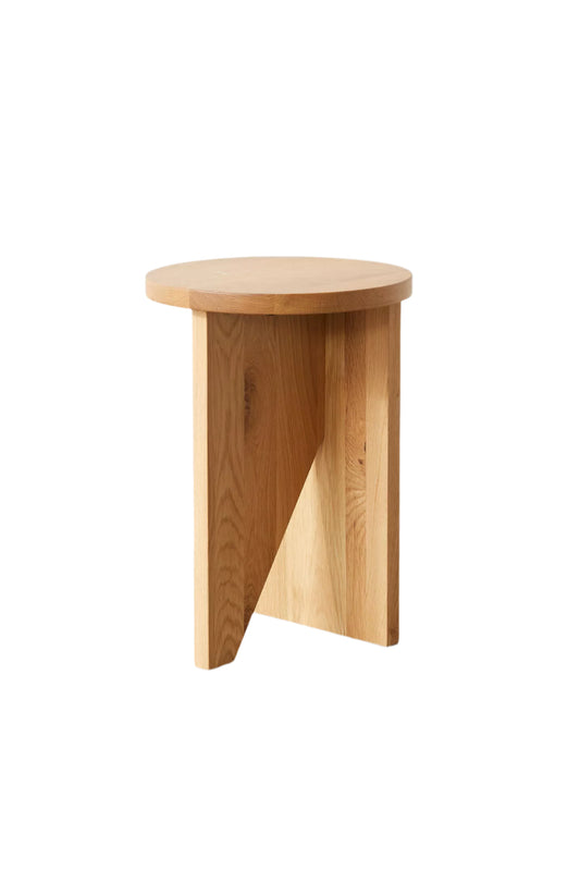 Moore solid wood side table with asymmetric design, handcrafted from FSC-certified oak or walnut. This versatile and timeless piece functions as both a coffee table and side table, offering bespoke, sustainable style for modern and compact living spaces.