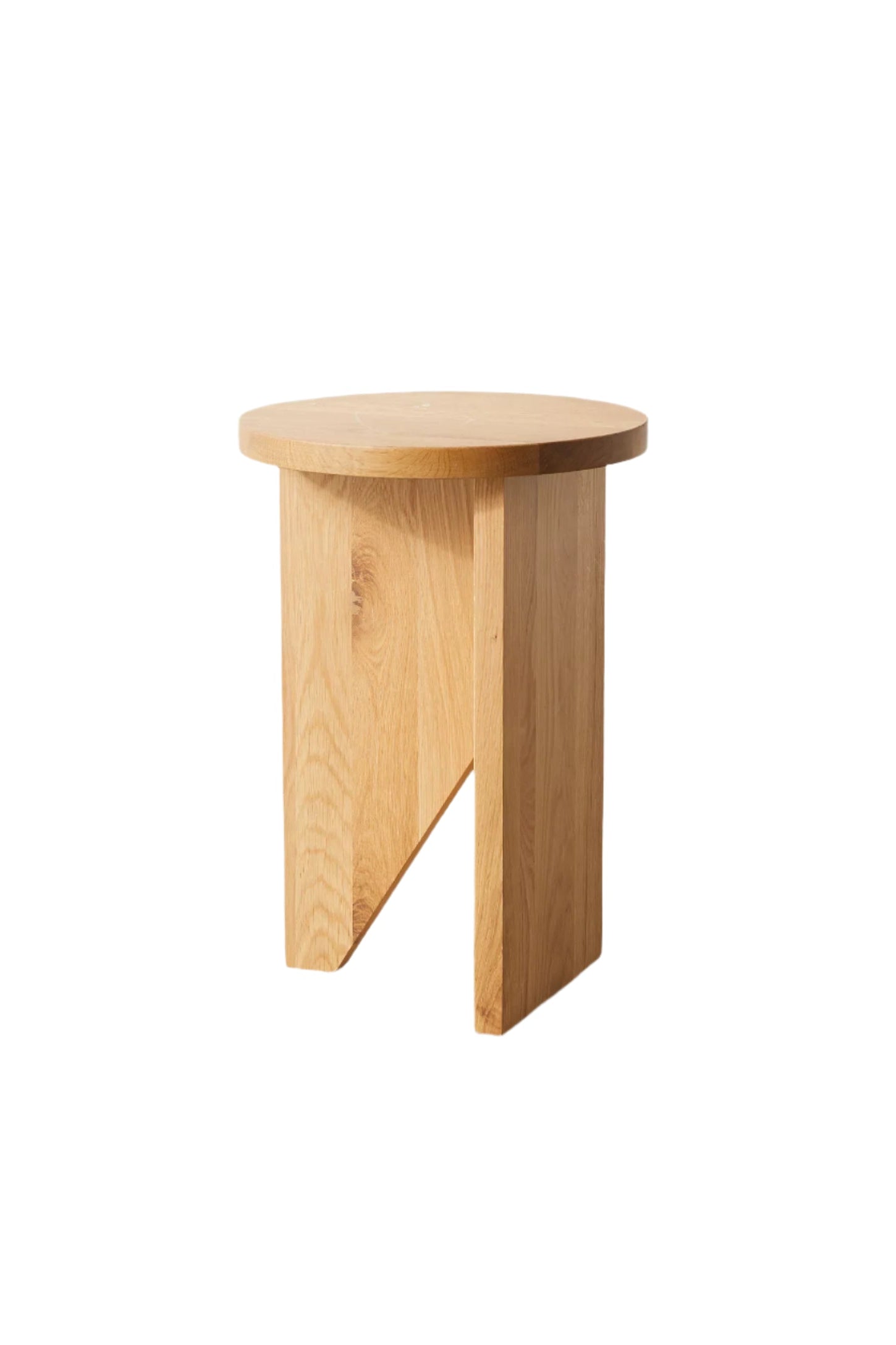 Moore solid wood side table with asymmetric design, handcrafted from FSC-certified oak or walnut. This versatile and timeless piece functions as both a coffee table and side table, offering bespoke, sustainable style for modern and compact living spaces.