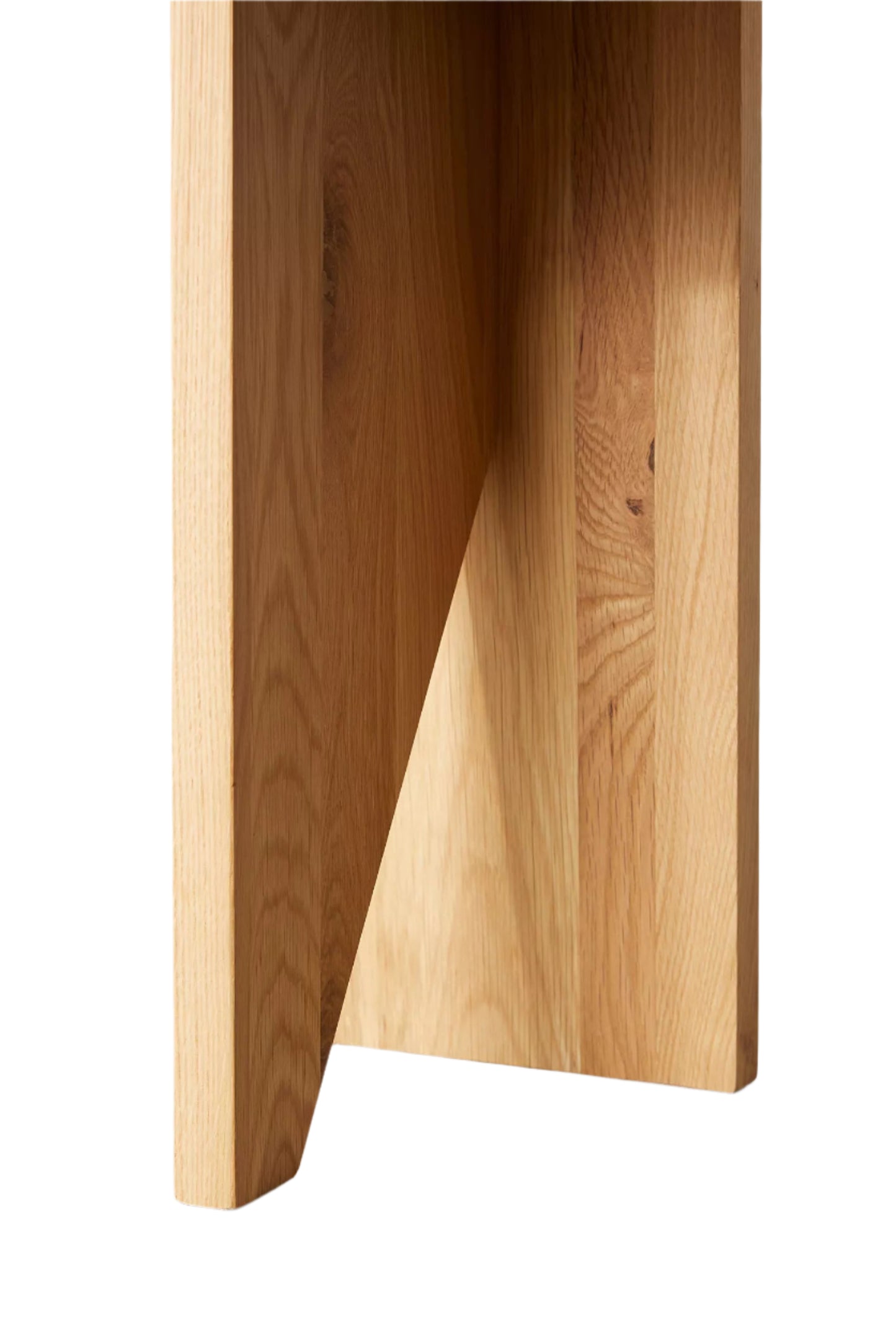 Moore solid wood side table with asymmetric design, handcrafted from FSC-certified oak or walnut. This versatile and timeless piece functions as both a coffee table and side table, offering bespoke, sustainable style for modern and compact living spaces.