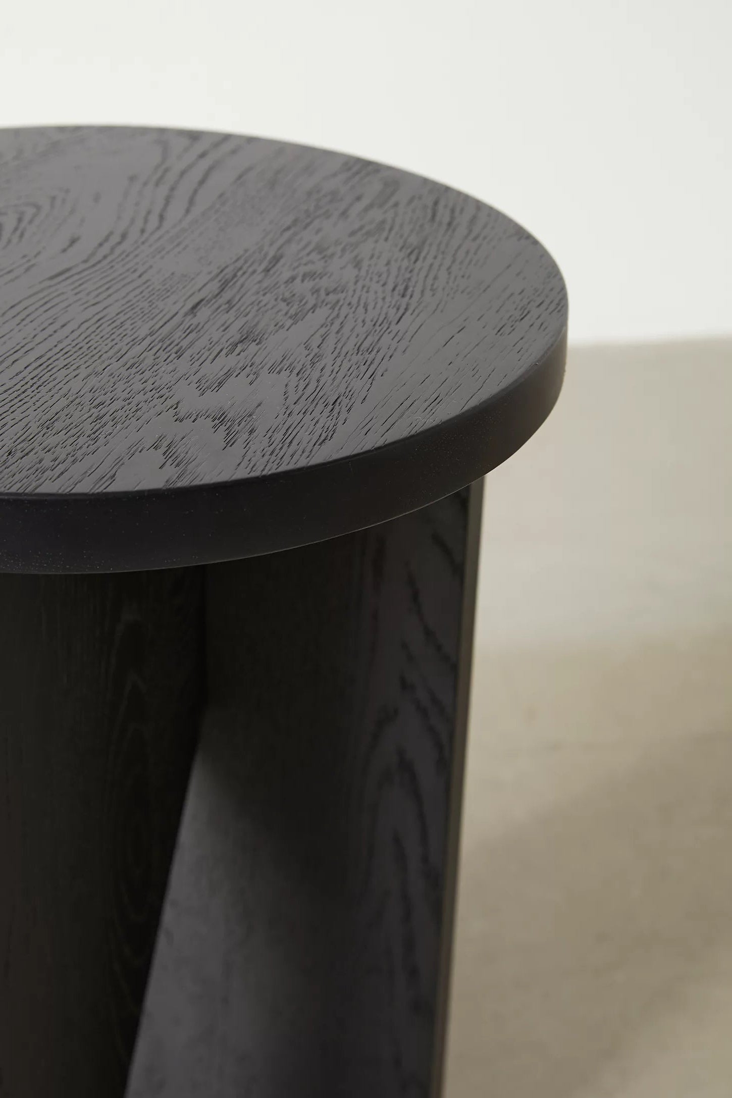 Moore solid wood side table with asymmetric design, handcrafted from FSC-certified oak or walnut. This versatile and timeless piece functions as both a coffee table and side table, offering bespoke, sustainable style for modern and compact living spaces.