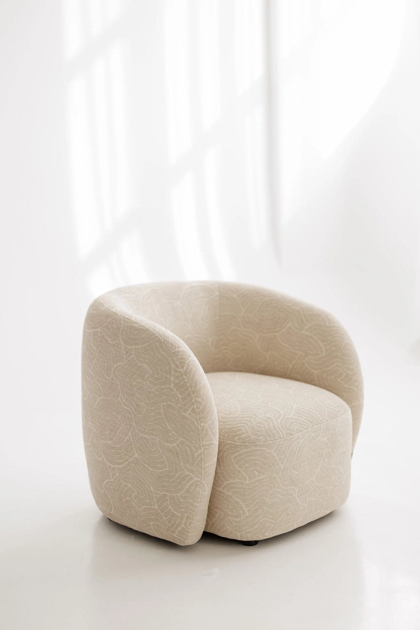 Custom fabric armchair on a white background
