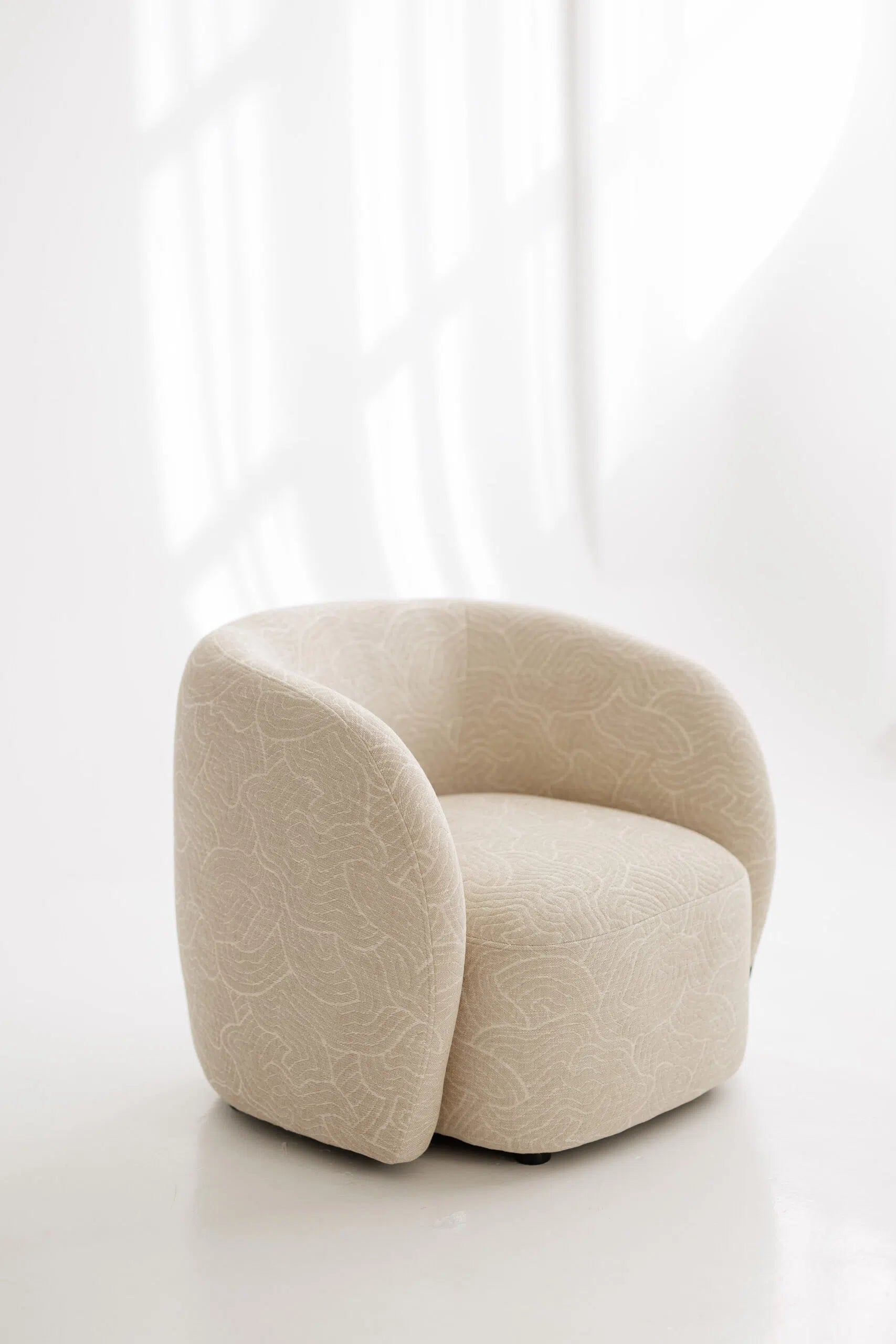 Custom fabric armchair on a white background
