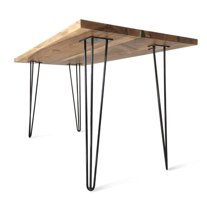 Rhea bespoke solid wood dining table handcrafted from FSC-certified oak or walnut planks, featuring a 4 cm thick tabletop with customizable live edge or clean-cut finish. A luxury, non-extendable table made to order in Europe, blending premium craftsmanship with modern elegance. Paired with black or golden metal legs for a refined, contemporary look, this sustainable dining piece celebrates natural materials and bespoke design.