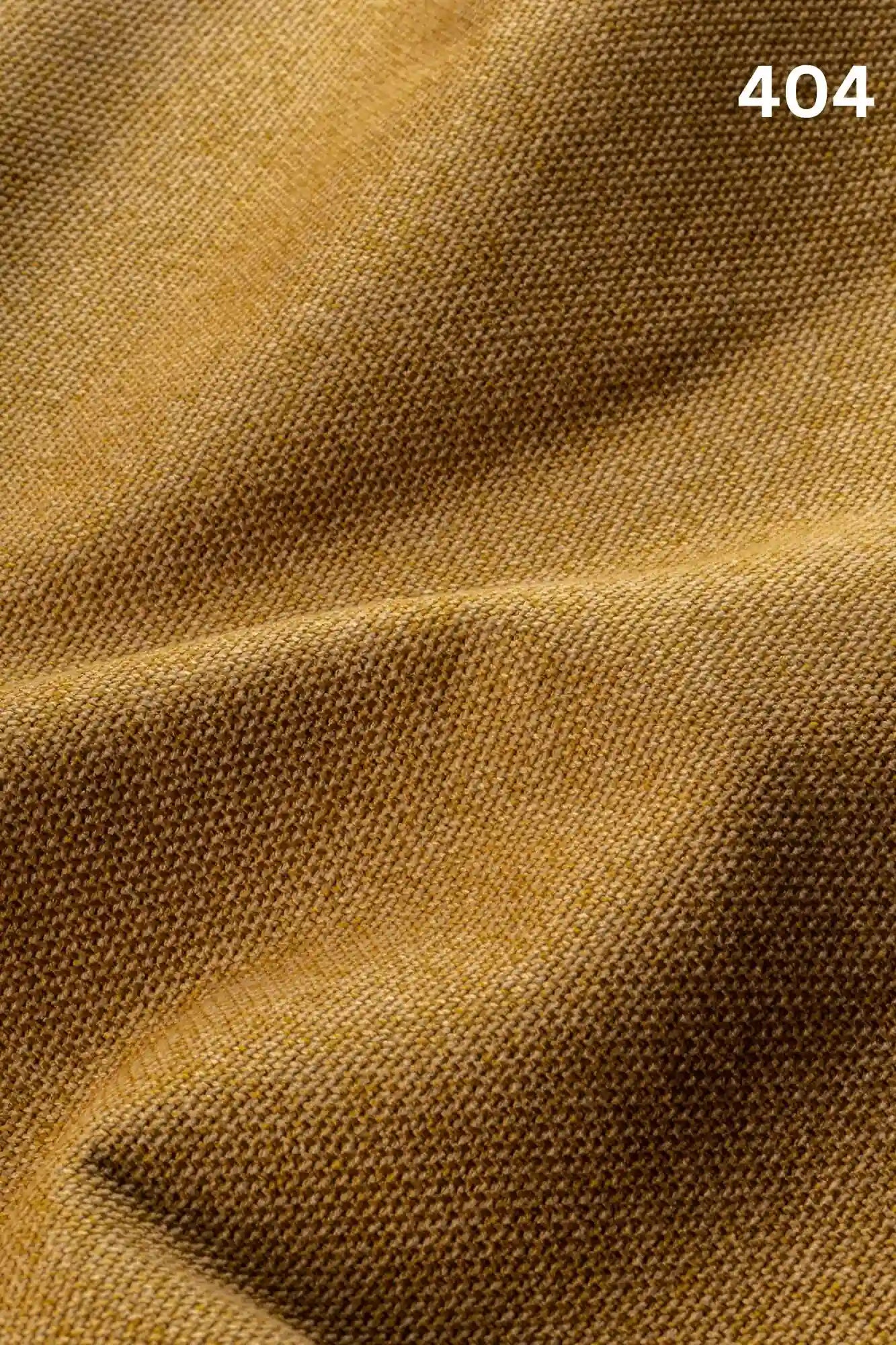 Close-up of yellow woven textured fabric for sofas with number '404' in the corner. 