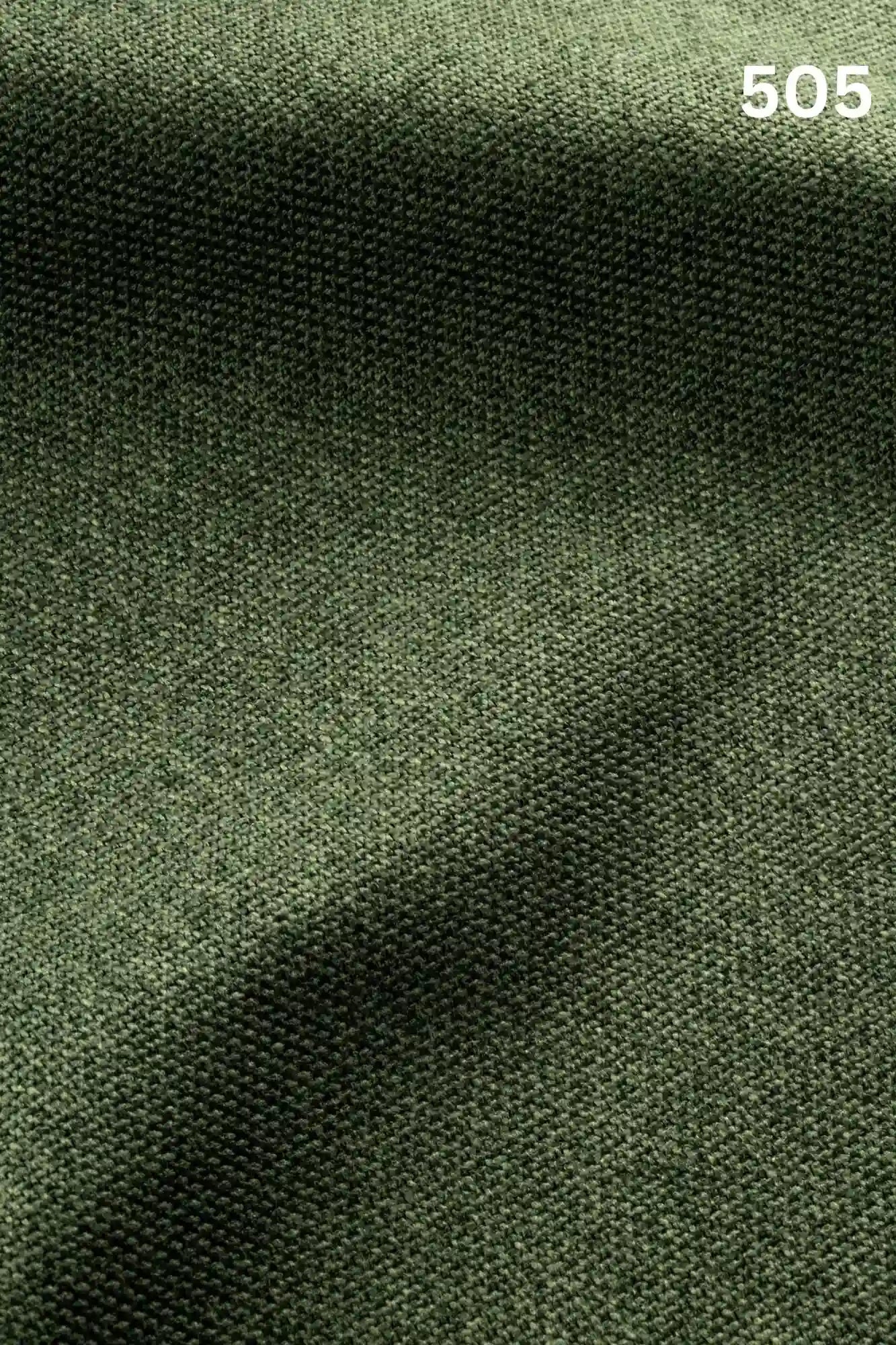 Close-up of green woven textured fabric for sofas with number '505' in the corner. 