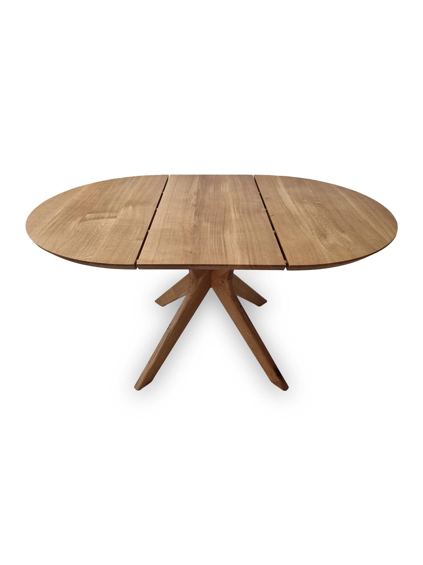 Vera extendable round dining table in clear oak with solid wood spider legs, natural finish, middle extension, 3cm thick top, handcrafted from FSC-certified solid oak, customizable size, color, and edge.