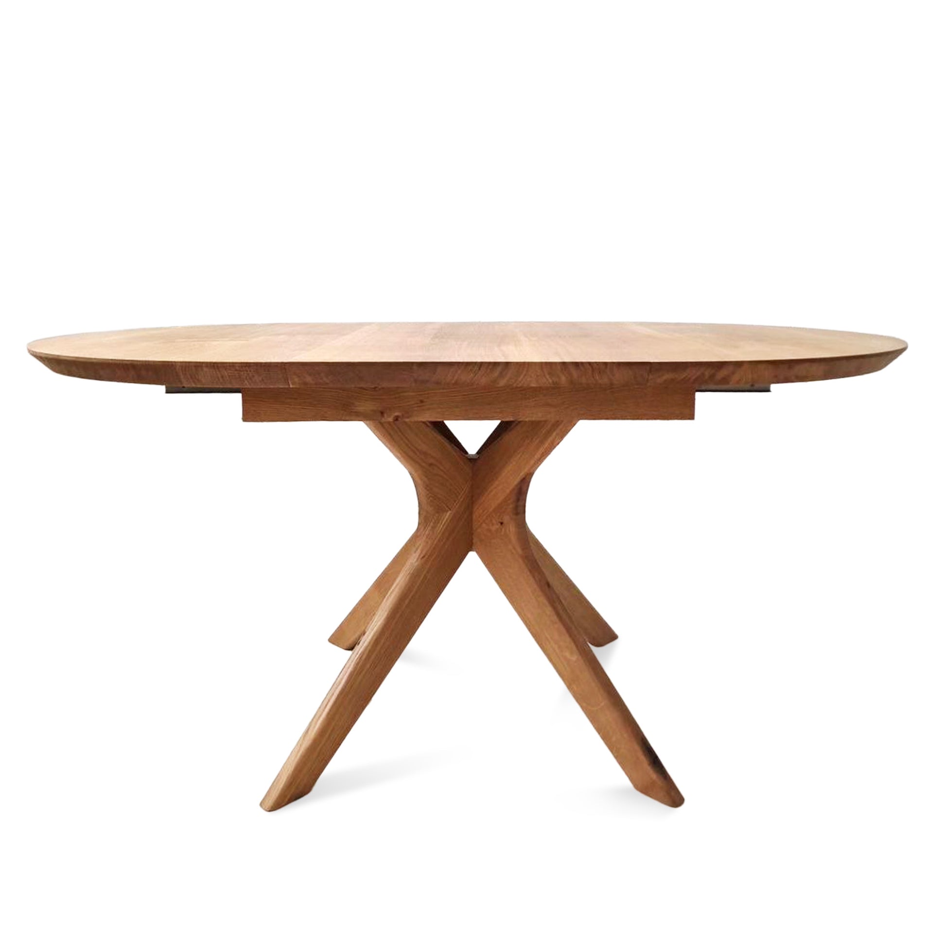 Vera extendable round dining table in clear oak with solid wood spider legs, natural finish, middle extension, 3cm thick top, handcrafted from FSC-certified solid oak, customizable size, color, and edge.