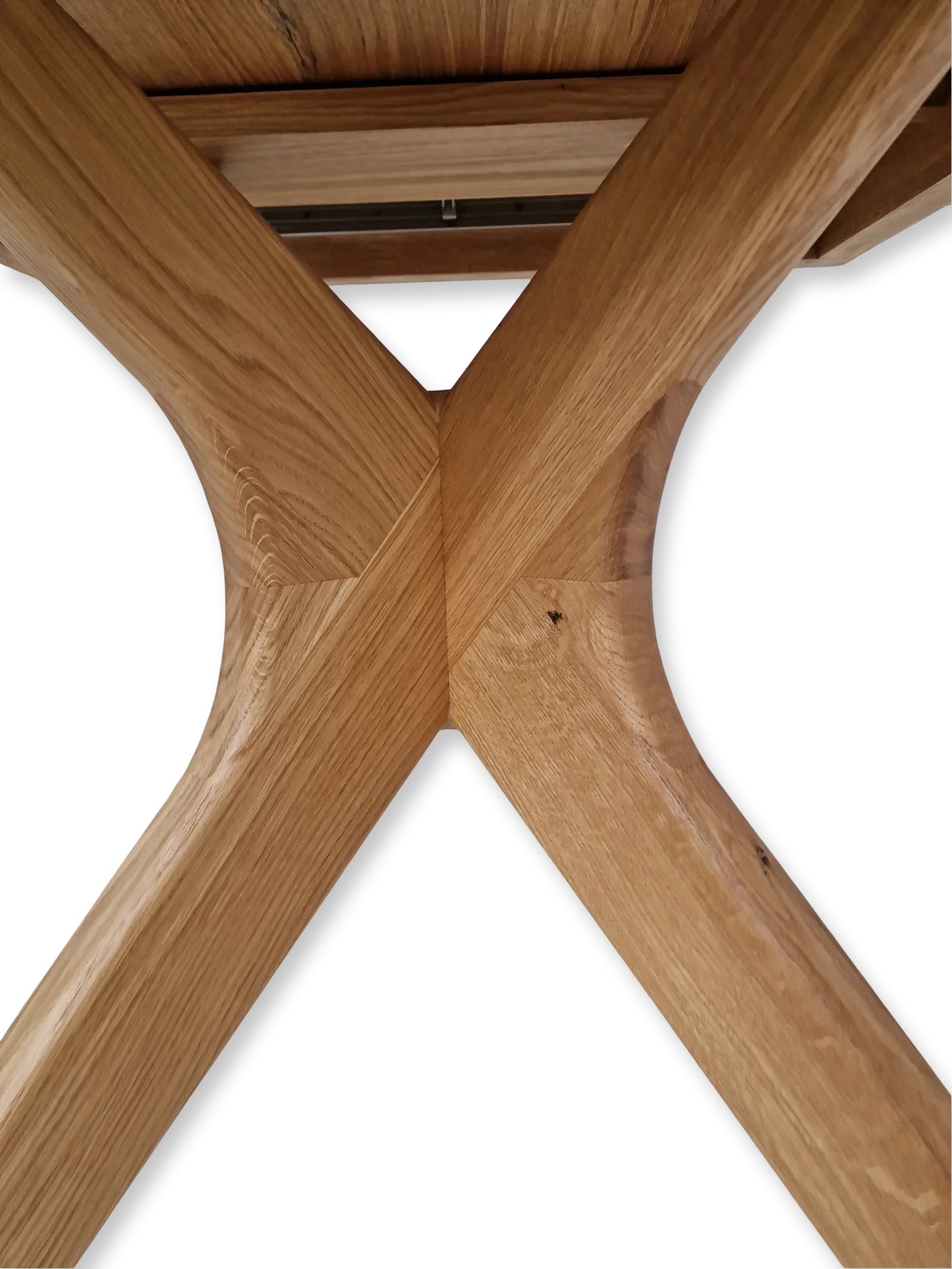 Vera extendable round dining table in clear oak with solid wood spider legs, natural finish, middle extension, 3cm thick top, handcrafted from FSC-certified solid oak, customizable size, color, and edge.
